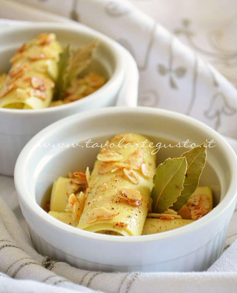 Cannelloni di platessa allo zafferano in sauté di mandorle Cannelloni di platessa allo zafferano in sauté di mandorle