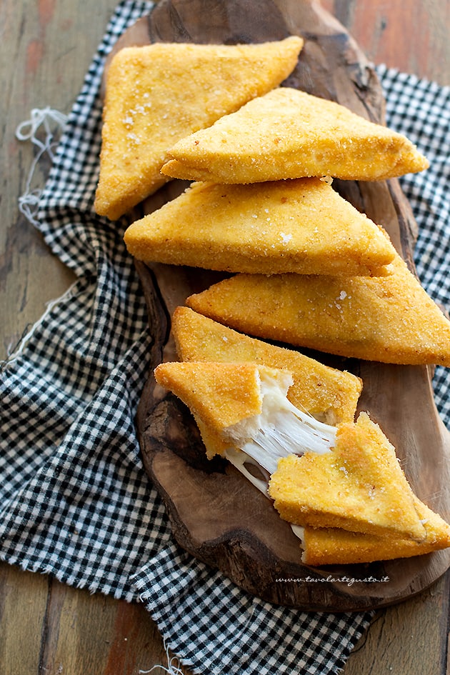 Mozzarella in carrozza al forno - Ricetta Mozzarella in carrozza al forno-