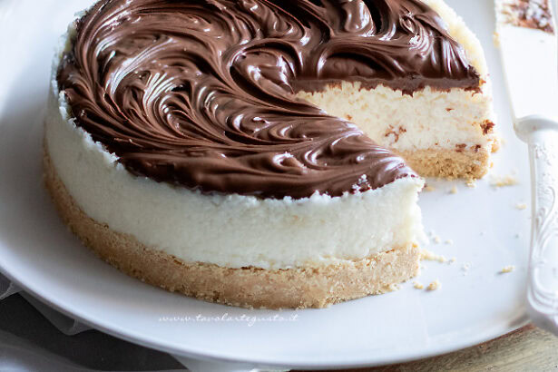 Cheesecake cocco e nutella - Cheesecake al cocco - Ricetta di Tavolartegusto